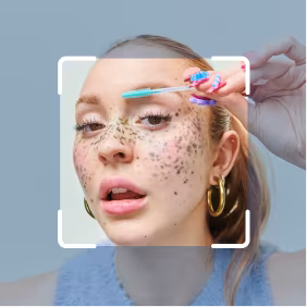 Photo editor retouching portrait with freckles and makeup